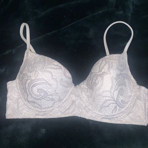 White lace bikini top with golden metal clasp